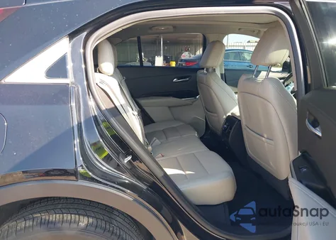 2021 Cadillac Xt4 Fwd Premium Luxury from USA, damaged, VIN 1GYFZCR46MF015221